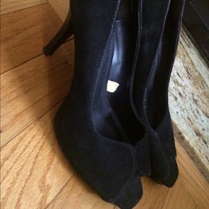 Black suede peep toe pumps
